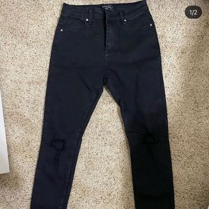 Black skinny jeans with little rips